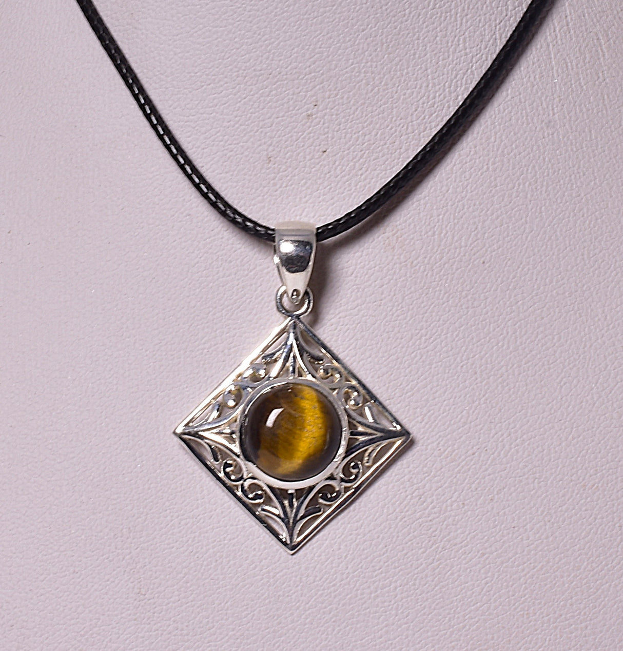 TIGER EYE CRYSTAL PENDANT set in STERLING SILVER J221