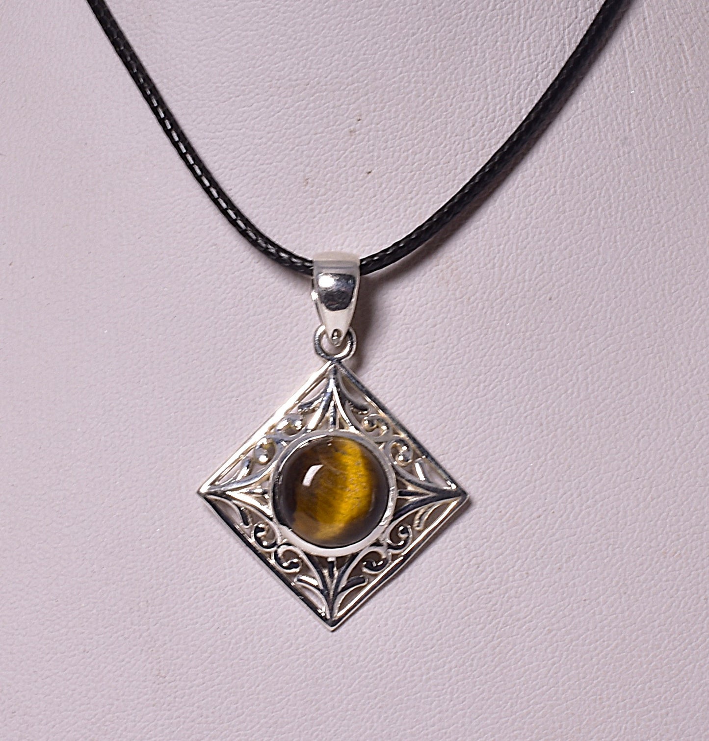 TIGER EYE CRYSTAL PENDANT set in STERLING SILVER J221