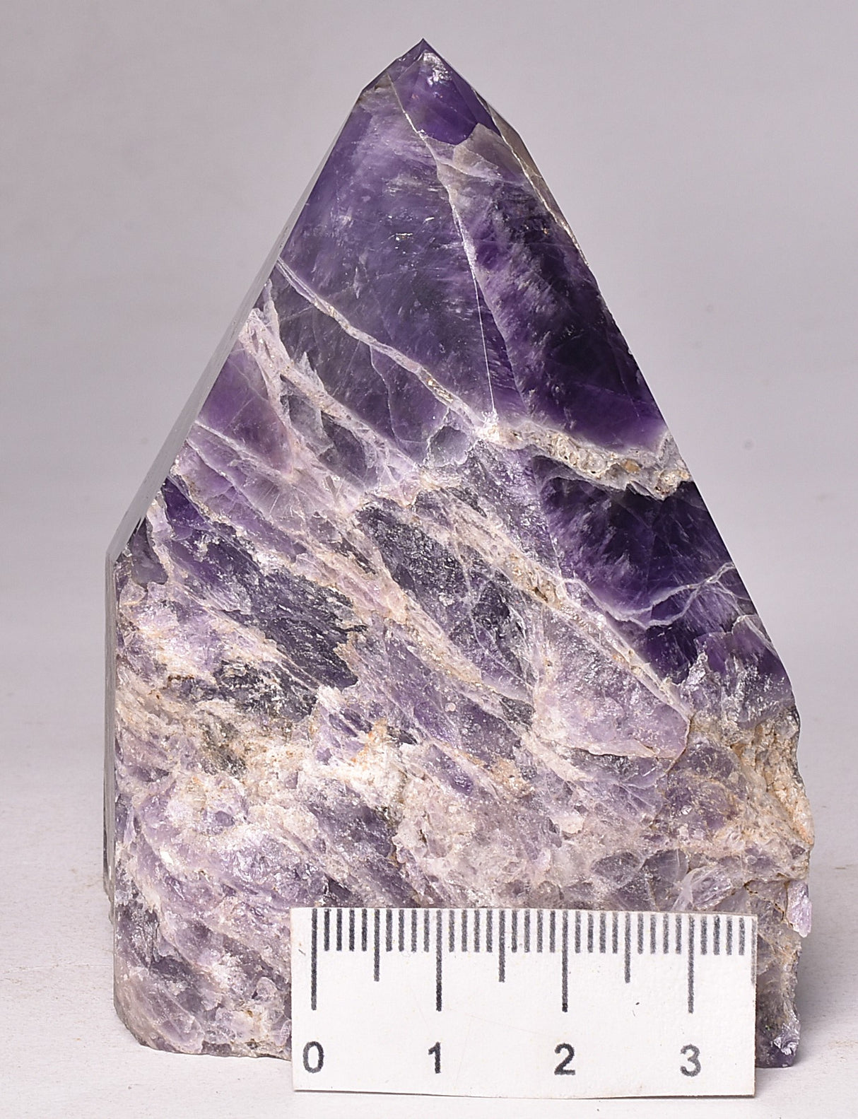 AMETHYST POINT, ROUGH BASE P999