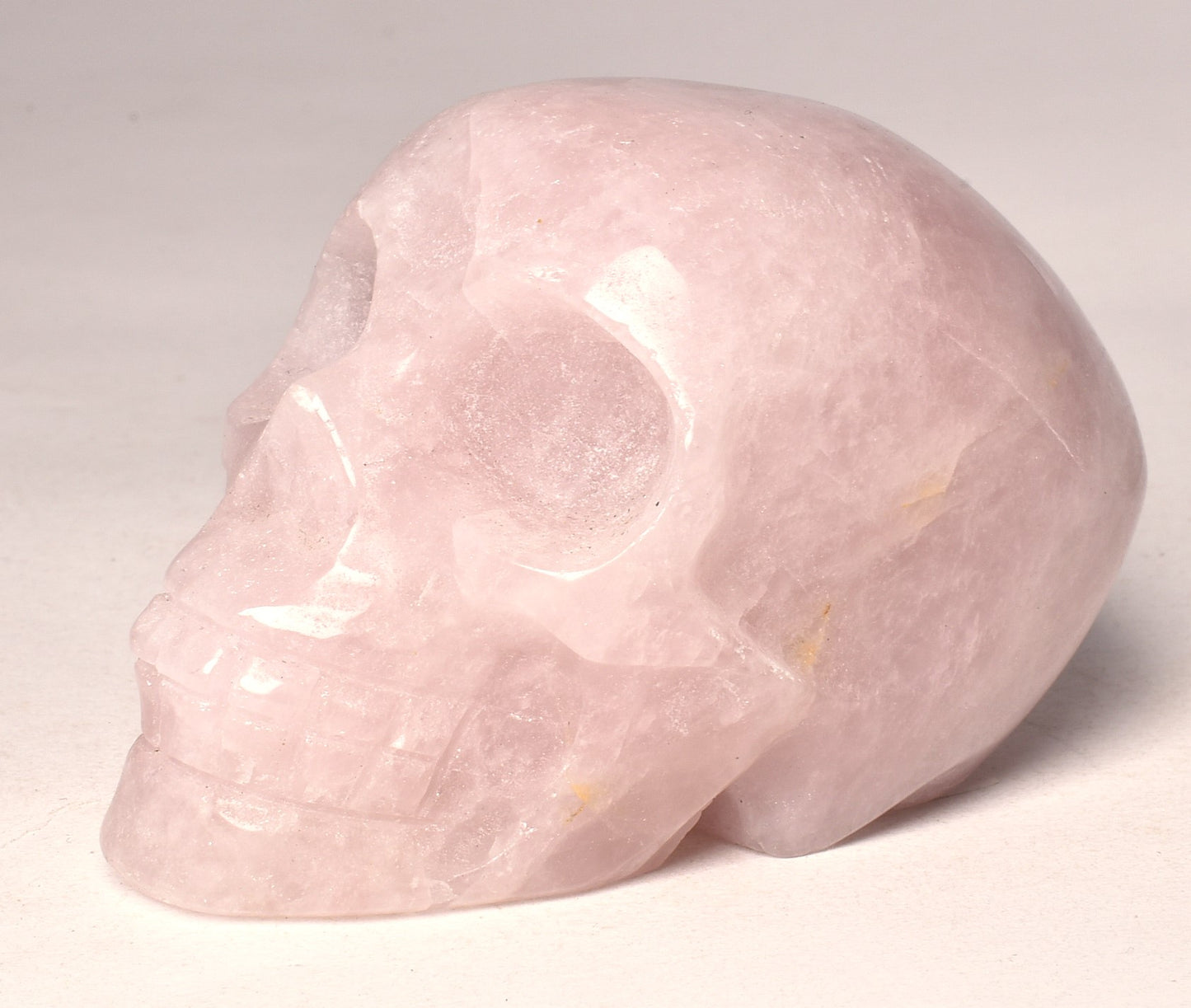 ROSE QUARTZ CRYSTAL CARVED SKULL P672
