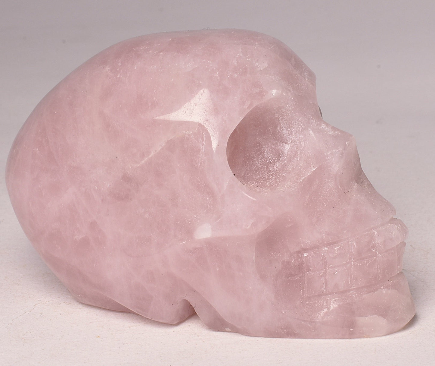 ROSE QUARTZ CRYSTAL CARVED SKULL P672