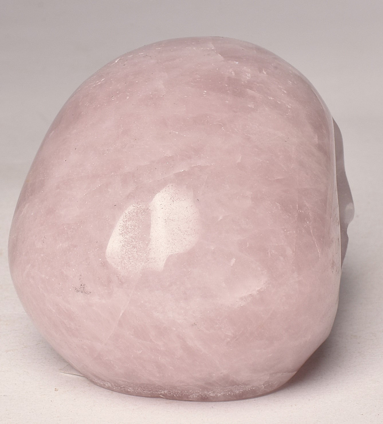 ROSE QUARTZ CRYSTAL CARVED SKULL P672