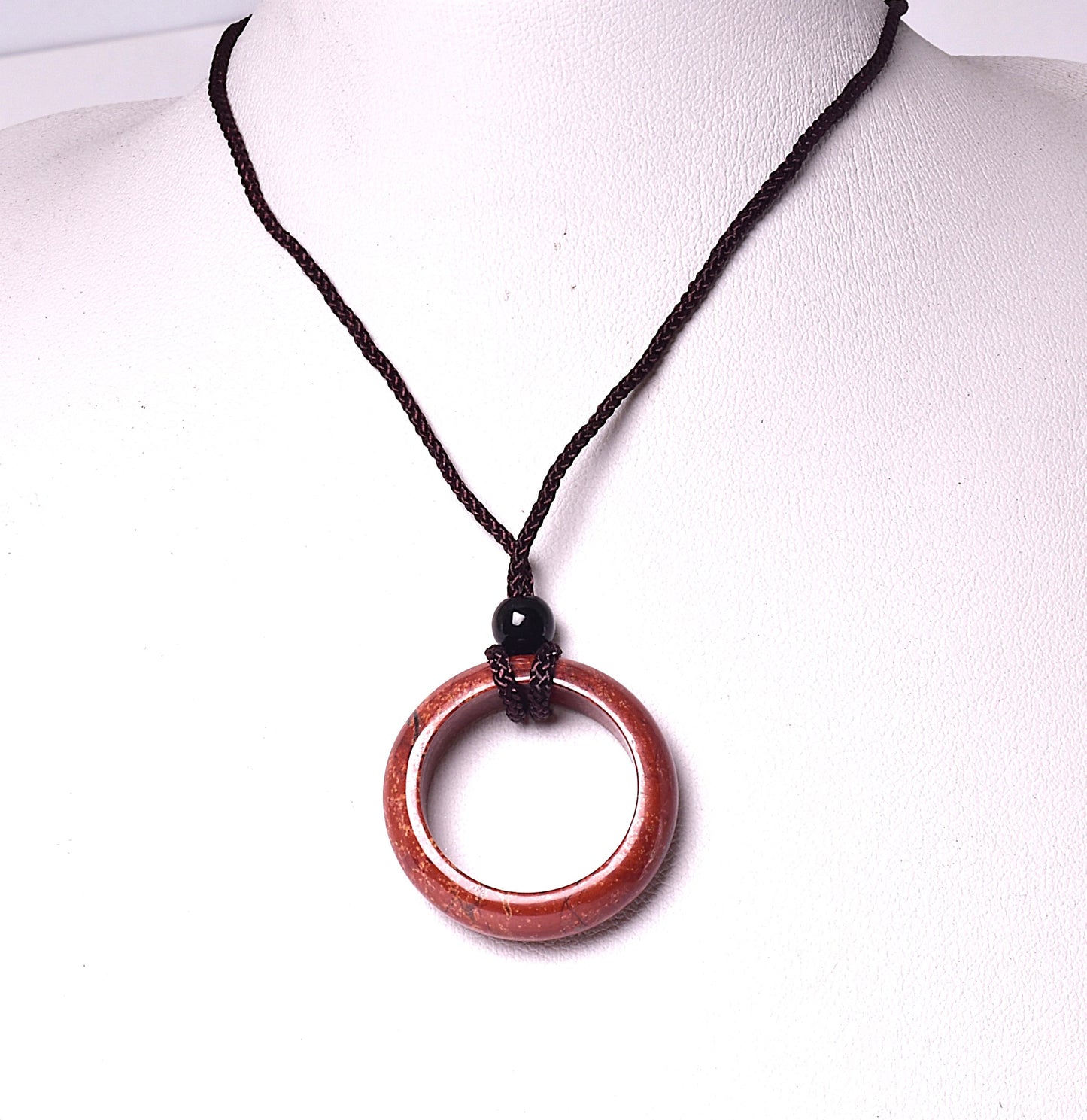 RED JASPER RING PENDANT ON CORD J237