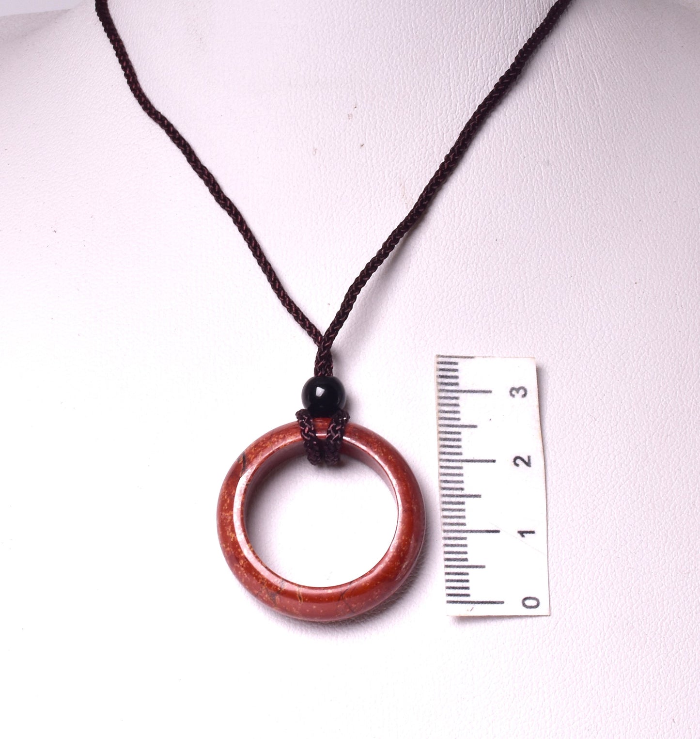 RED JASPER RING PENDANT ON CORD J237