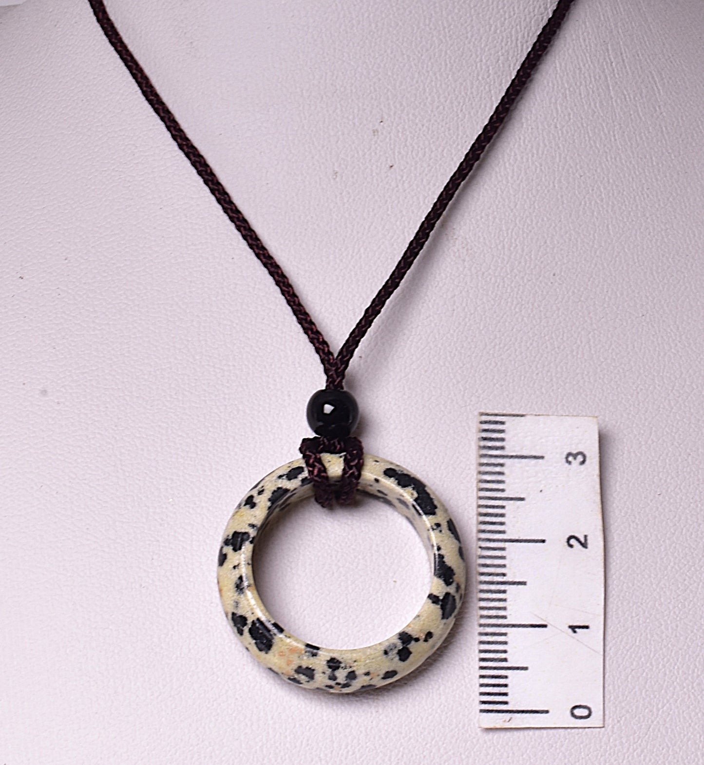 DALMATIAN RING PENDANT ON CORD J241