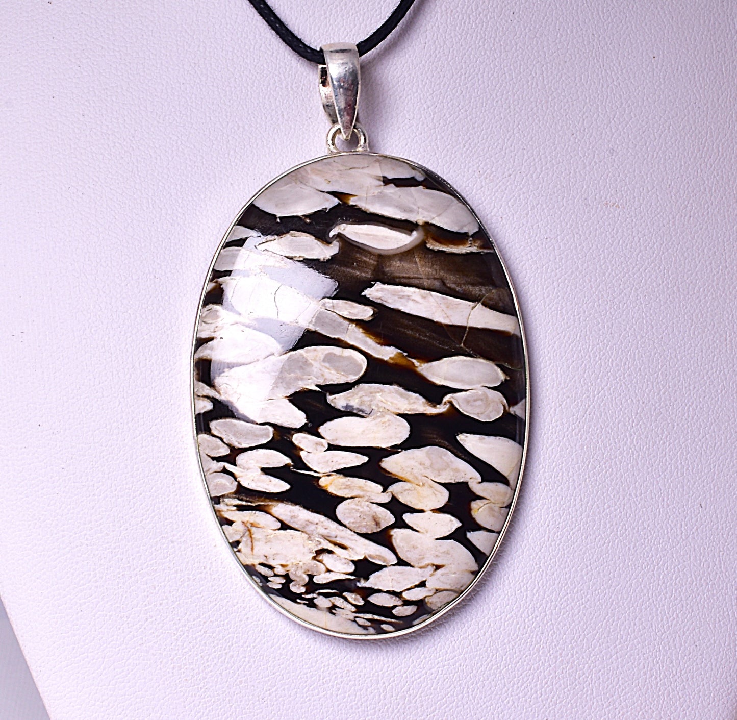 FOSSIL PEANUT WOOD PENDANT, set in STERLING SILVER J84