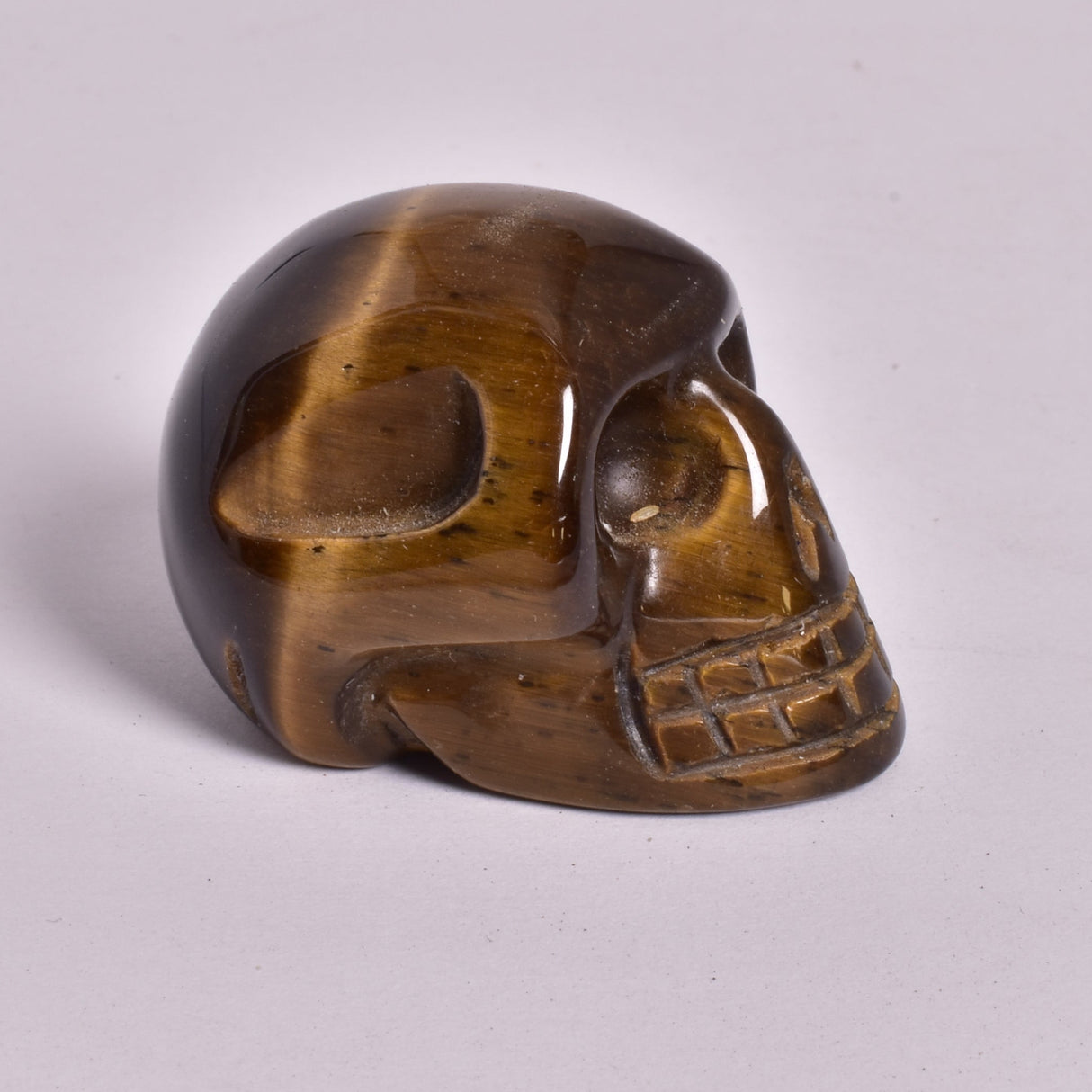 TIGER EYE CRYSTAL CARVED SKULL P252