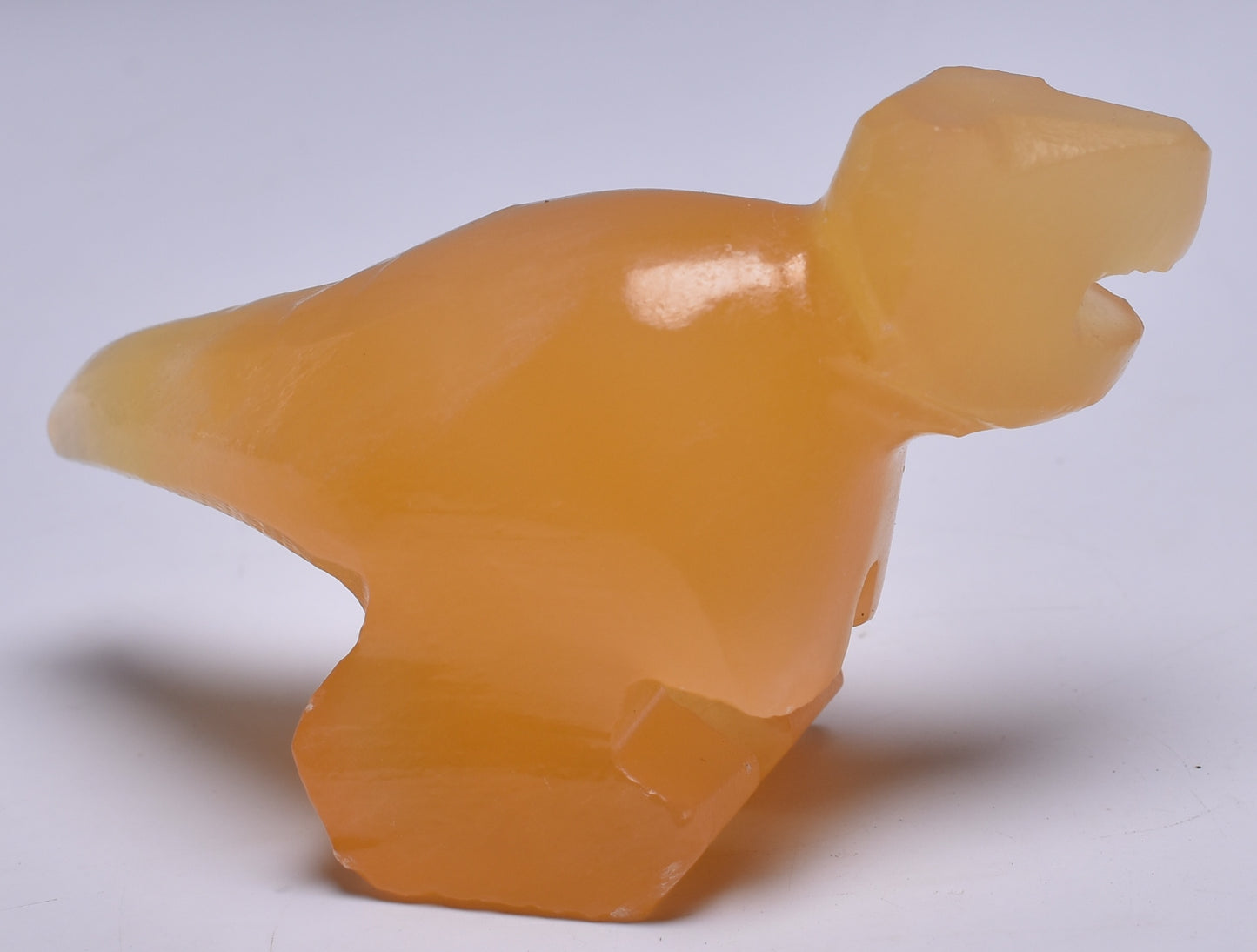 ORANGE CALCITE CRYSTAL DINOSAUR CARVING P514