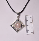 ROSE QUARTZ CRYSTAL PENDANT set in STERLING SILVER J223