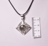 TOURMALATED QUARTZ CRYSTAL PENDANT set in STERLING SILVER J230