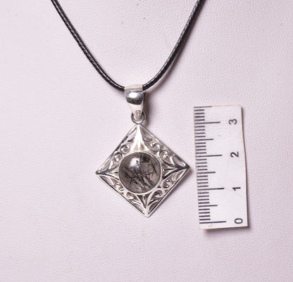 TOURMALATED QUARTZ CRYSTAL PENDANT set in STERLING SILVER J230