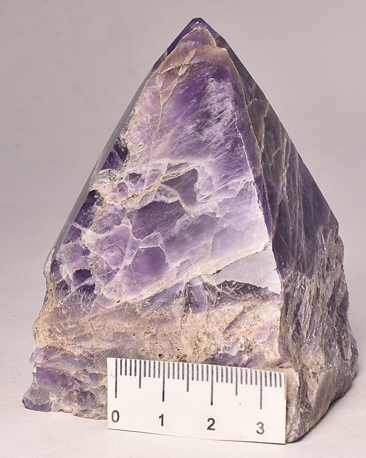 AMETHYST POINT, ROUGH BASE P999