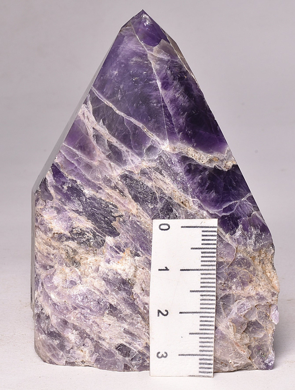 AMETHYST POINT, ROUGH BASE P999