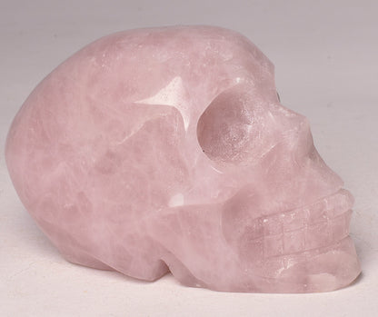 ROSE QUARTZ CRYSTAL CARVED SKULL P672