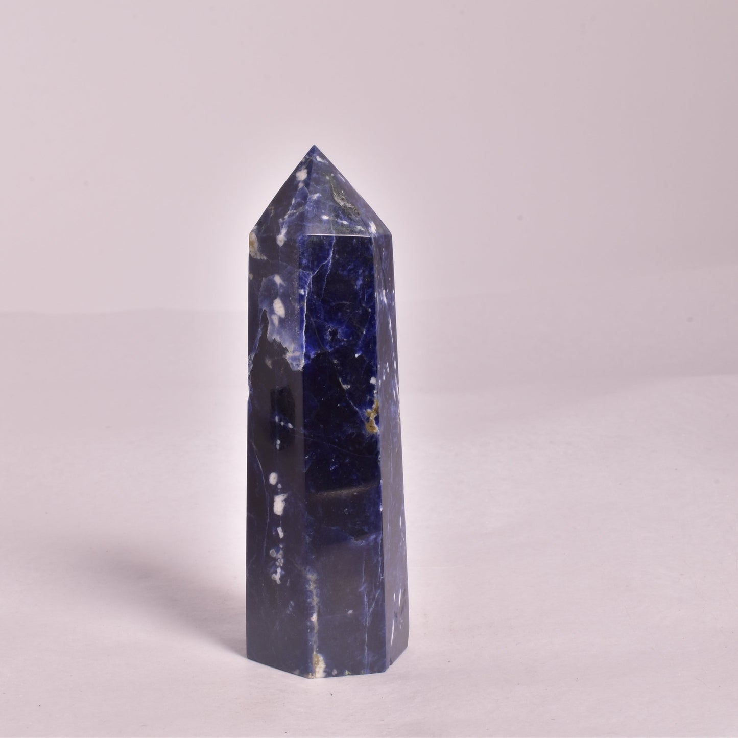 SODALITE CRYSTAL 6 SIDED POINT GENERATOR P185