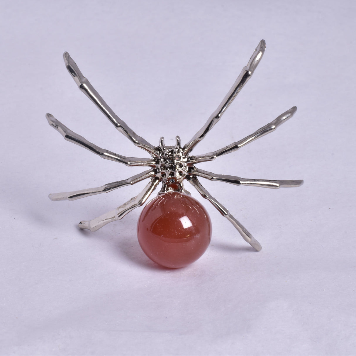CARNELIAN SPHERE ON METAL SPIDER P369