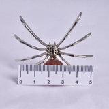 CARNELIAN SPHERE ON METAL SPIDER P369