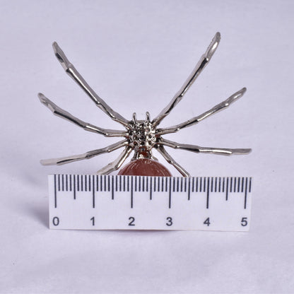 CARNELIAN SPHERE ON METAL SPIDER P369
