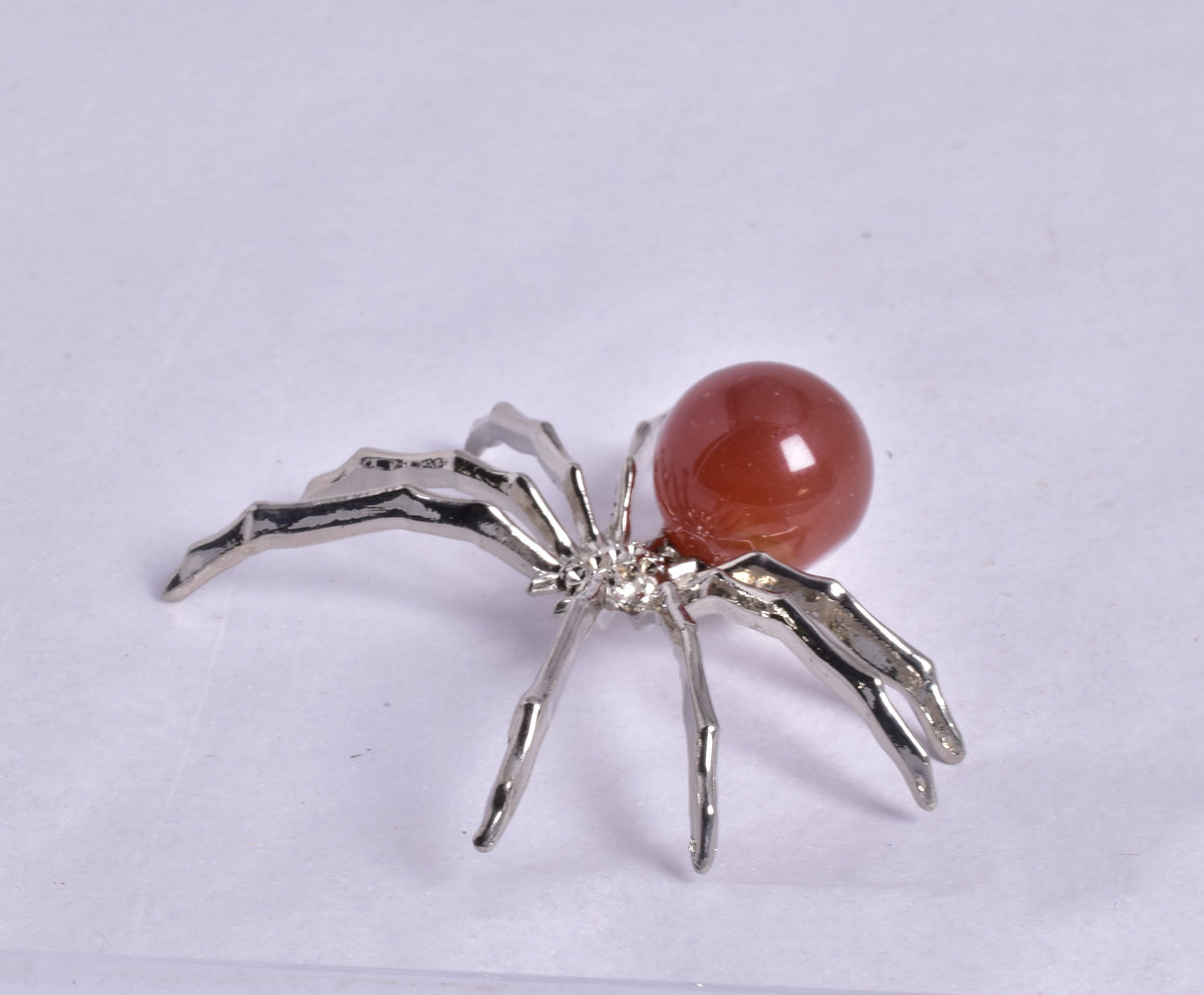 CARNELIAN SPHERE ON METAL SPIDER P369