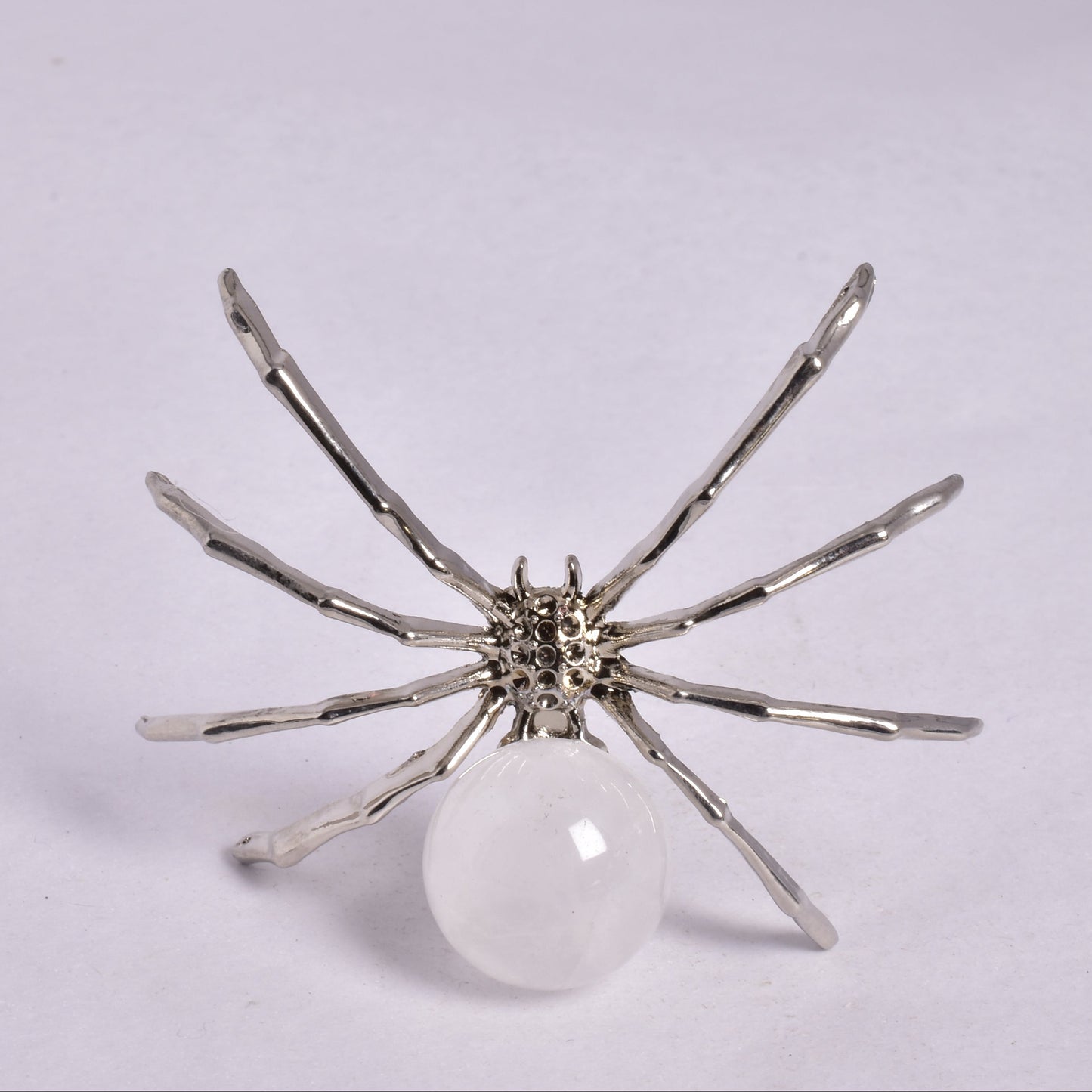 QUARTZ SPHERE ON METAL SPIDER P372