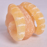 ORANGE CALCITE SKULL WITH RAM HORNS P420