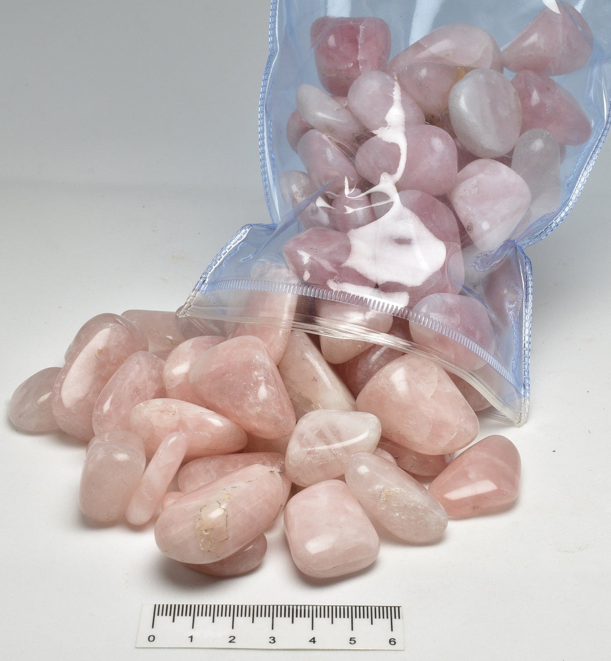 ROSE QUARTZ POLISHED TUMBLES 1KG BAG P397
