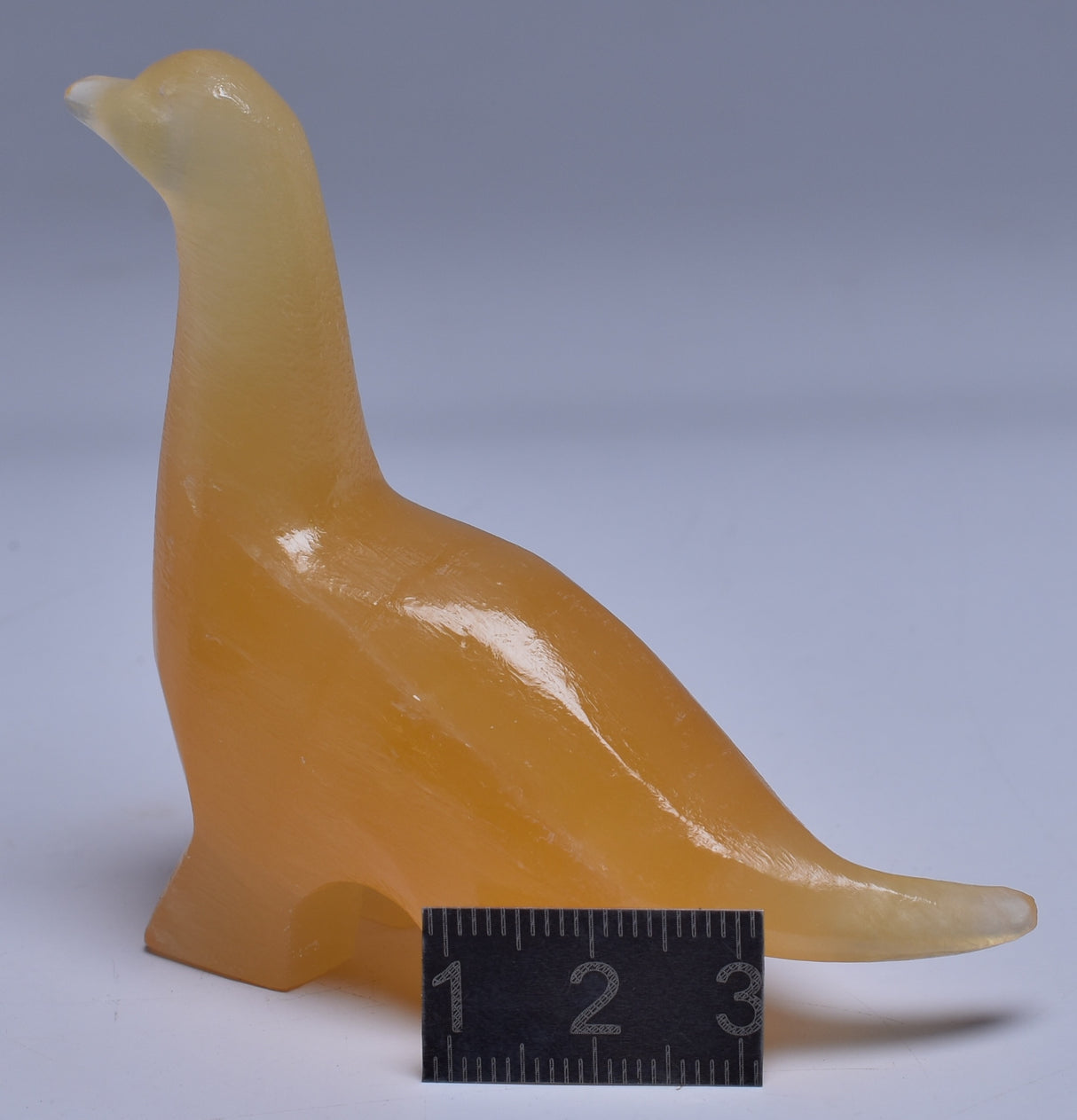 ORANGE CALCITE CRYSTAL DINOSAUR CARVING P512