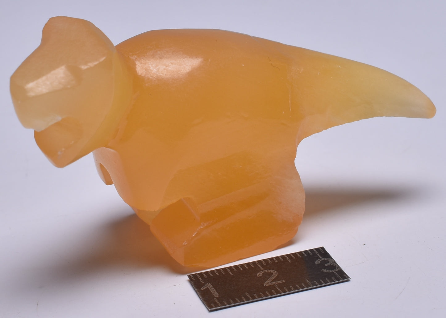 ORANGE CALCITE CRYSTAL DINOSAUR CARVING P514